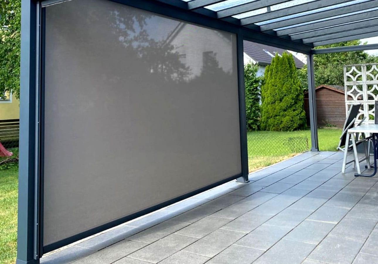 Zip screen blinds on a poolside terrace