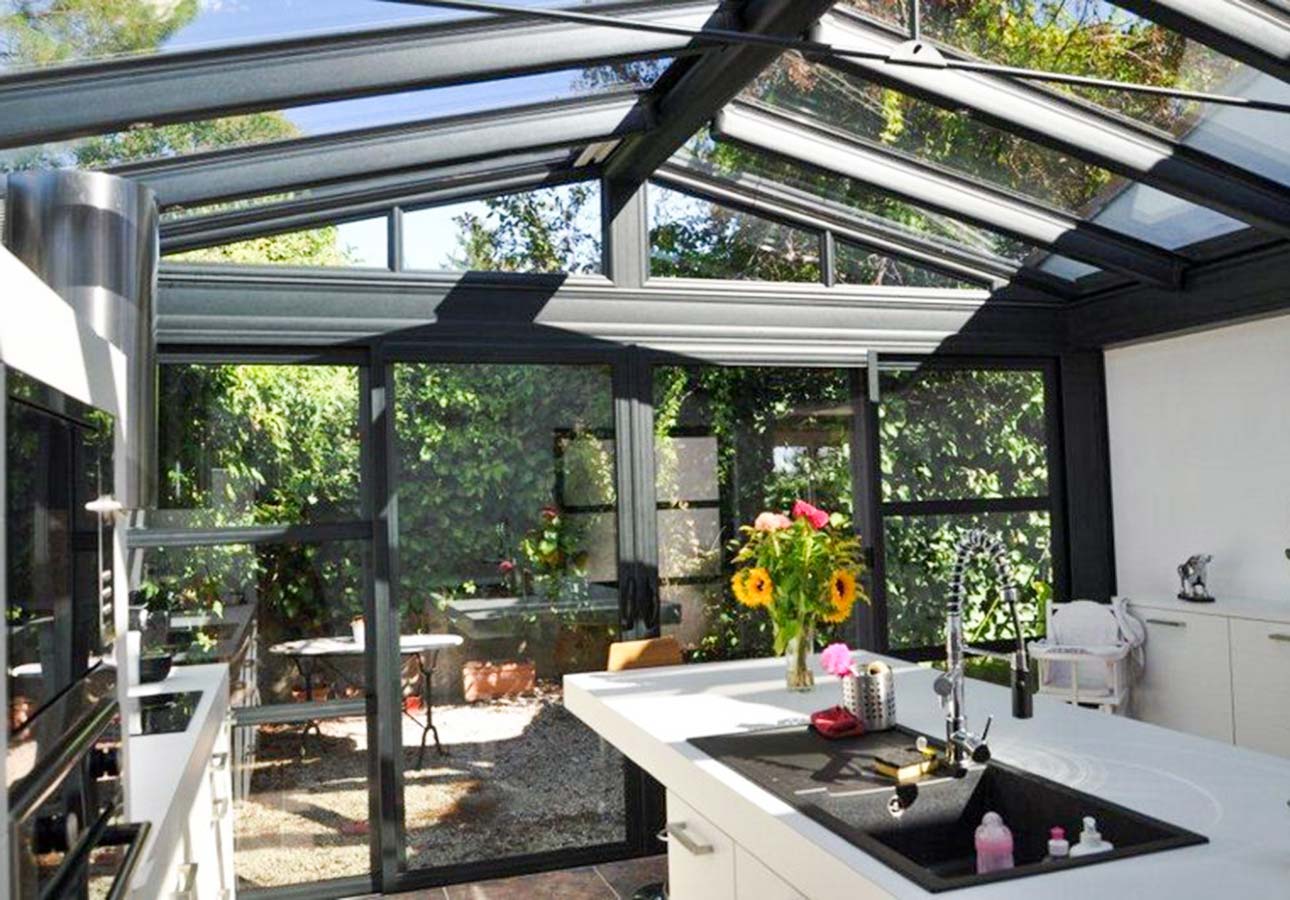 Fixed Glass Roof Pergola - Elegant Outdoor Roof Solutions 3 Bifolding-patio-doors-External-premium-Folding-Doors-UK-London-Local