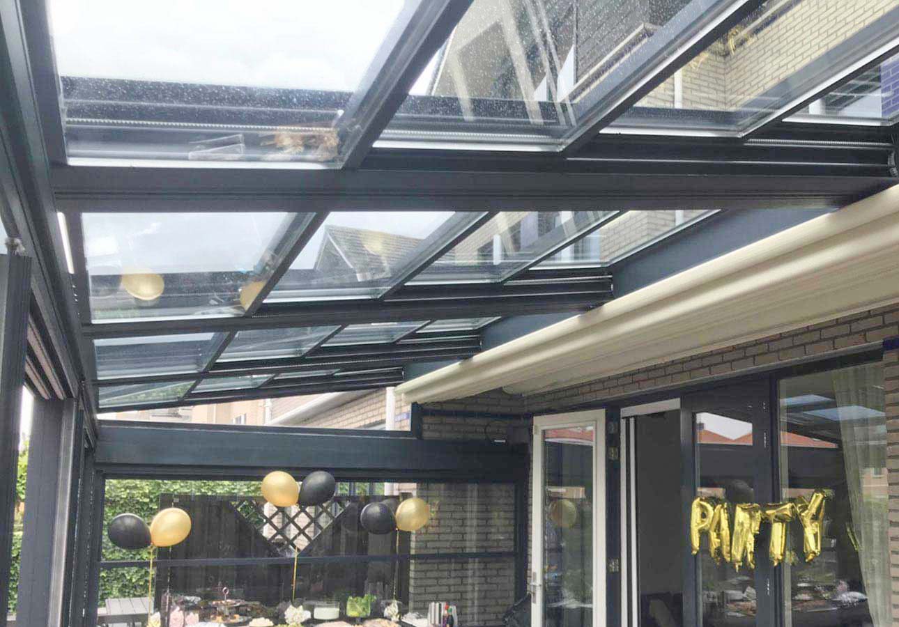 Glass roof veranda over a restaurant terrace