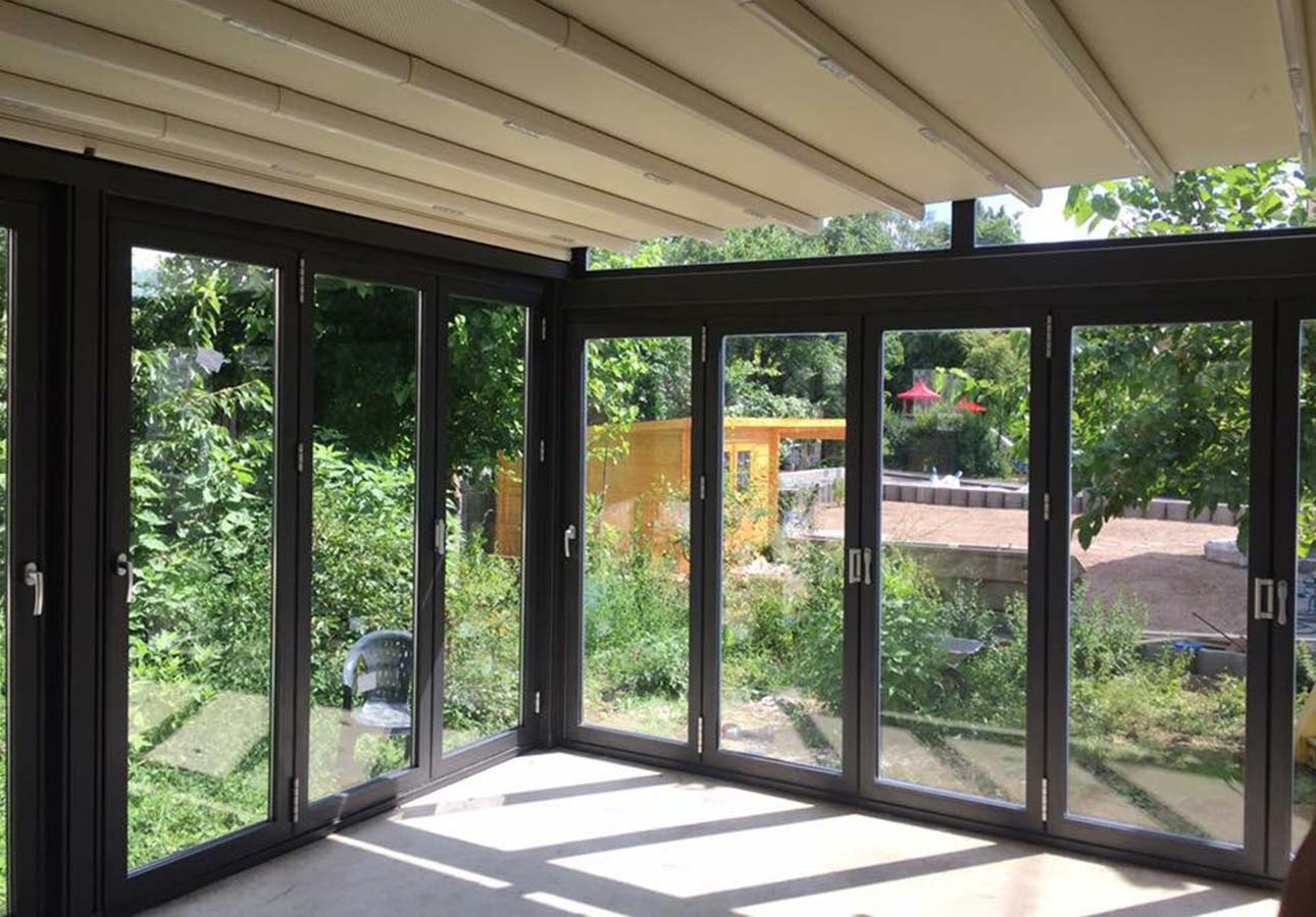 Retractable-Glass-Roof-Sliding-Glass-Roofs-Opening-Glass-Roof-Veranda-Electric-sliding-glass-Room-UK-1290x1000