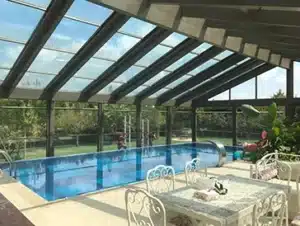 Retractable aluminium pool enclosure for safe year-round use