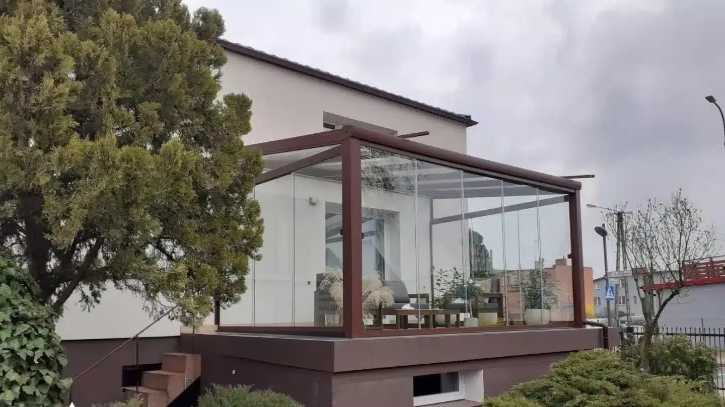 Fixed glass roof veranda at the back of a house