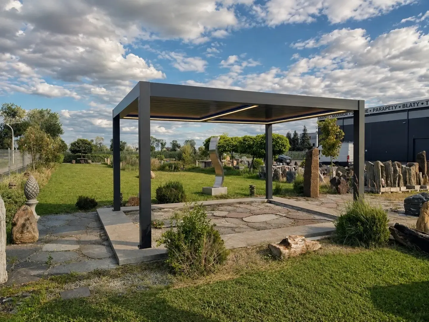 Freestanding bioclimatic pergola in a large garden