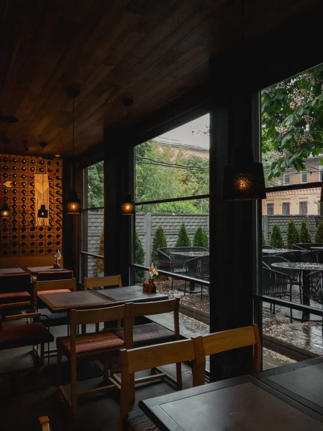 Garden café enclosure with guillotine glass