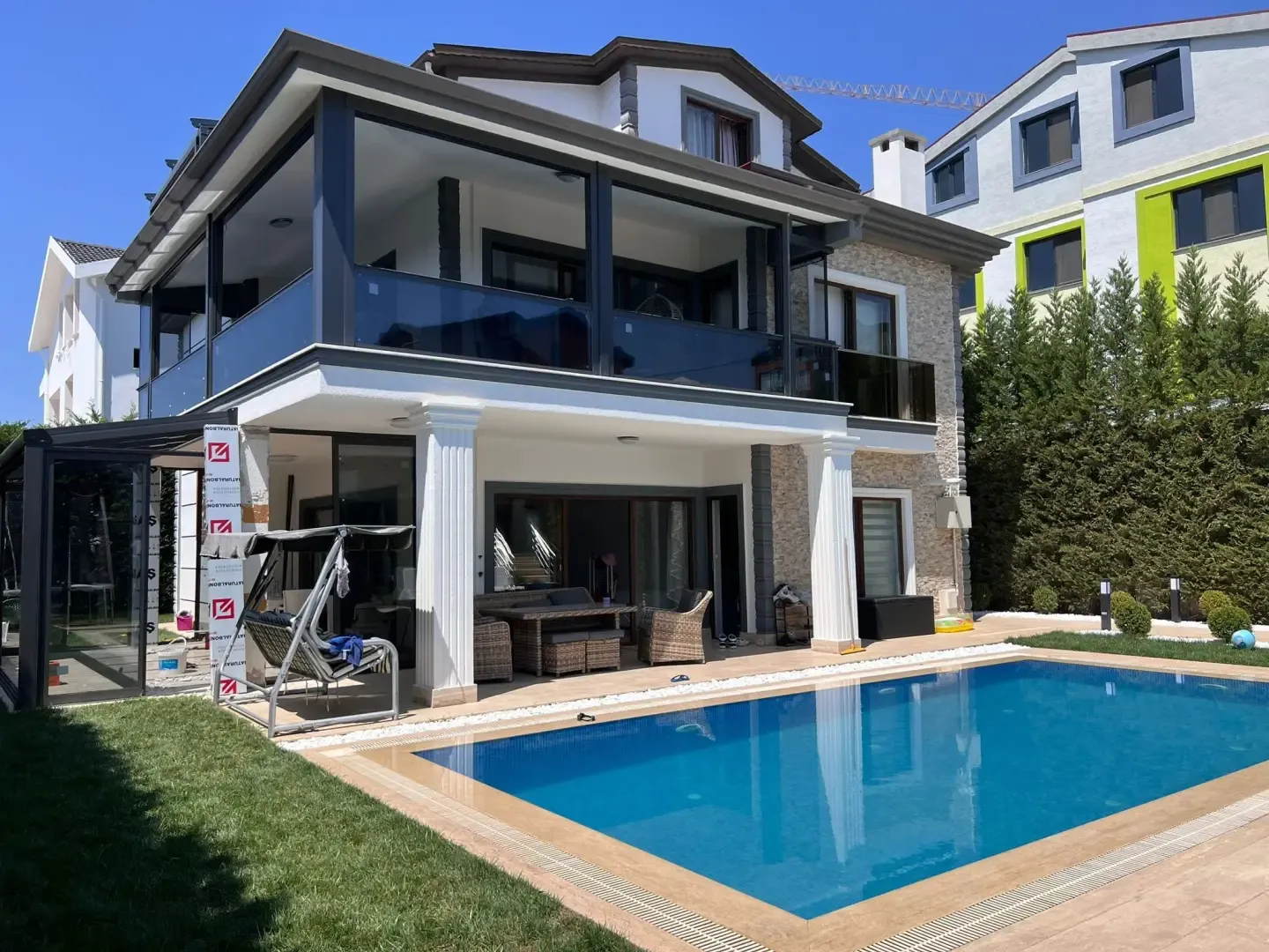 Modern house balcony with guillotine glazing