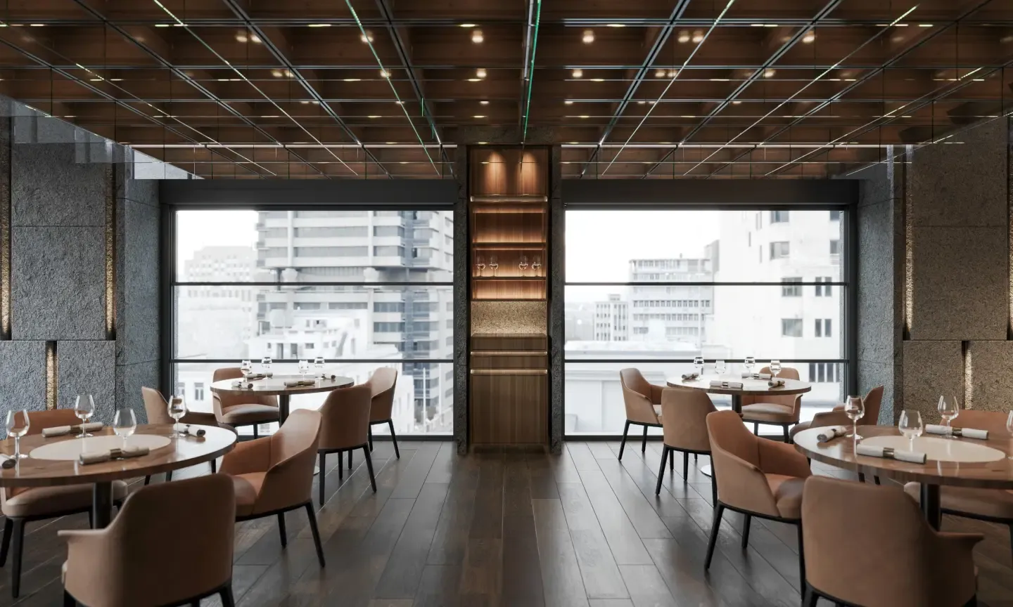 Restaurant dining room enclosed with guillotine glass