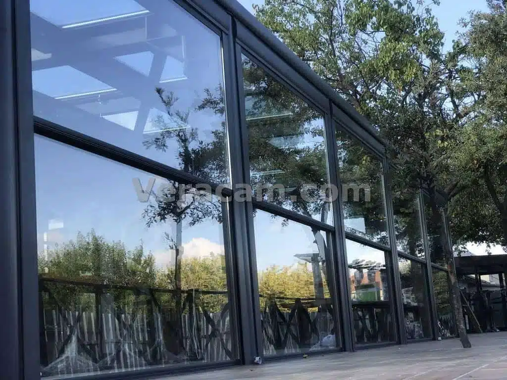 Villa terrace with guillotine glass panels