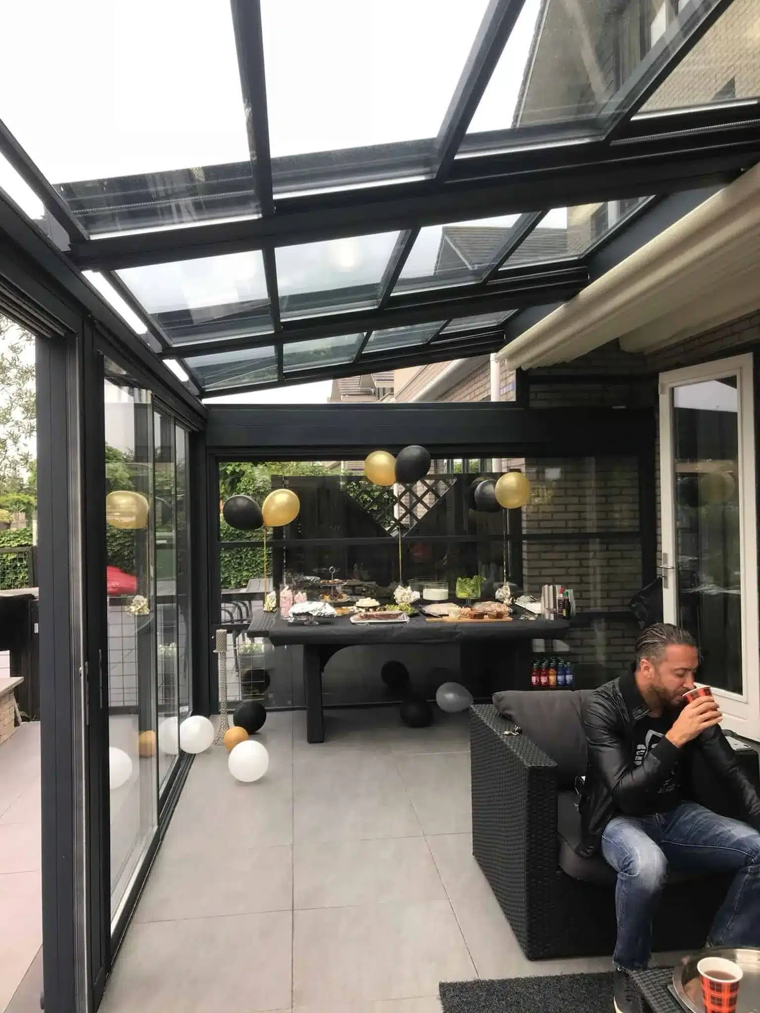 Café interior under a retractable glass roof