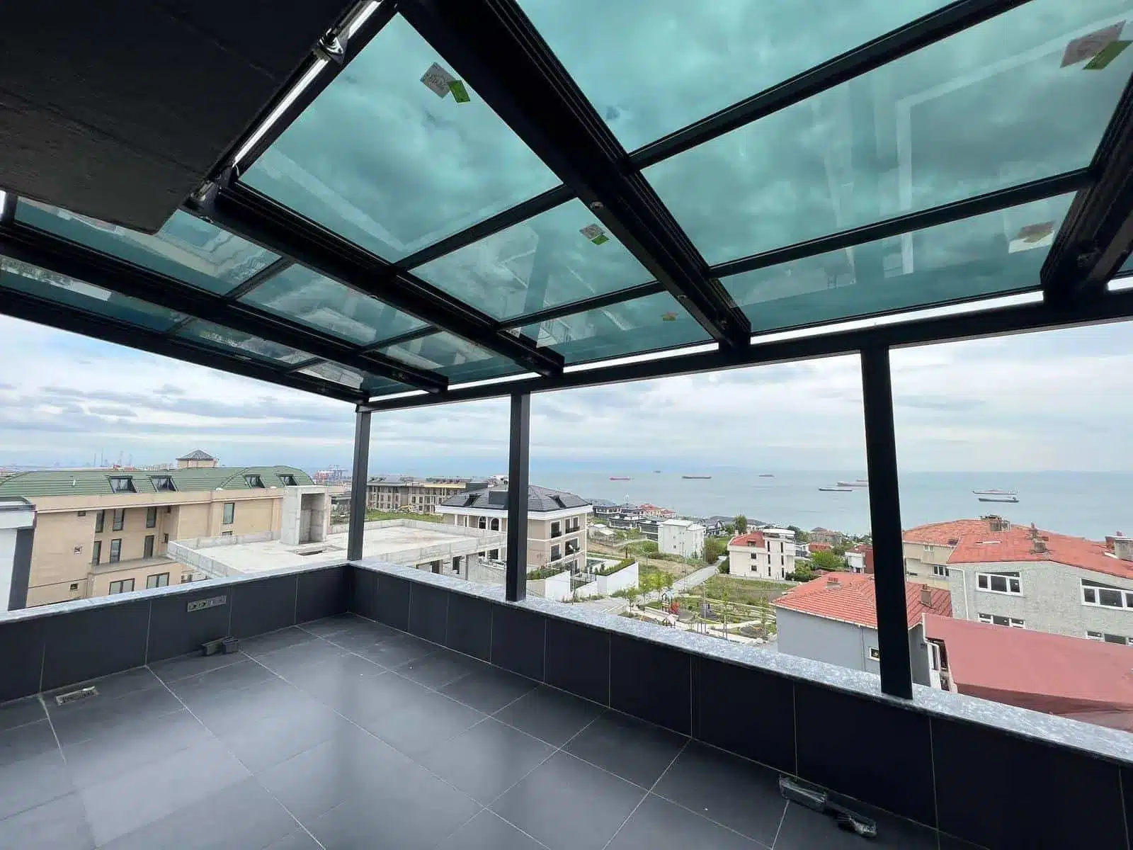 Glass roof terrace with city views