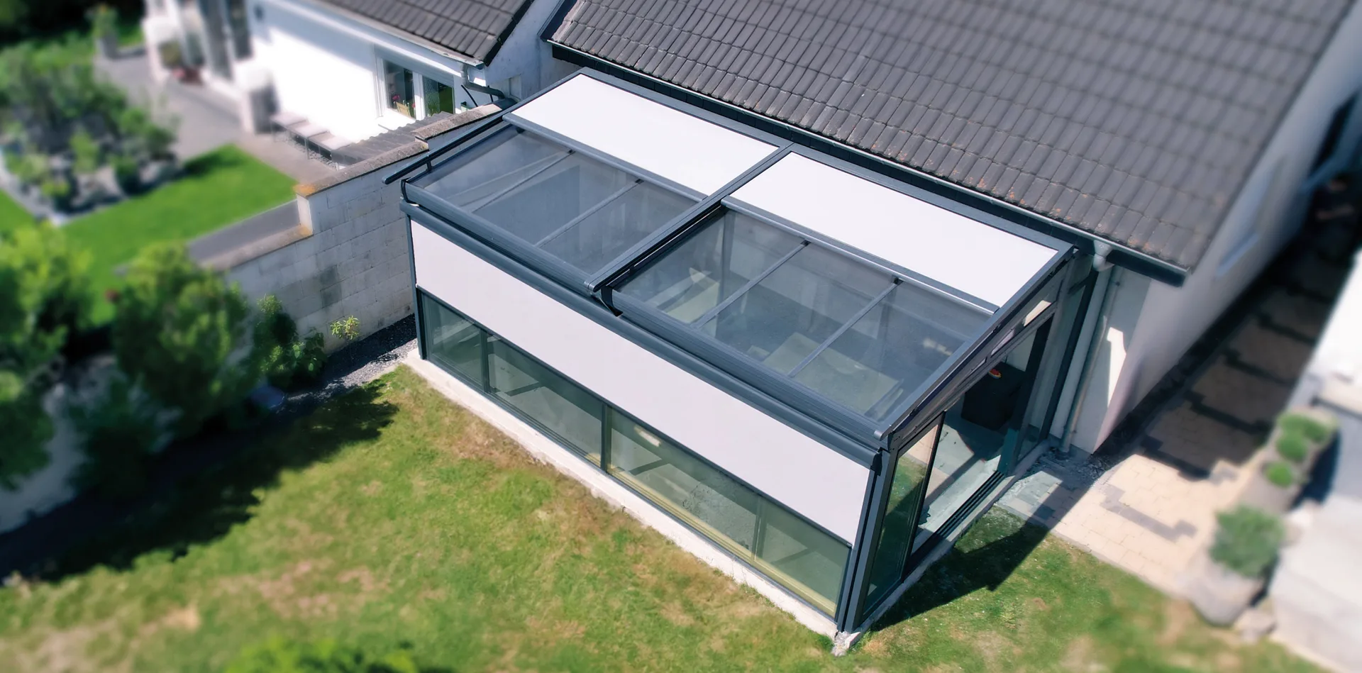 External roof blinds on a winter garden glass roof