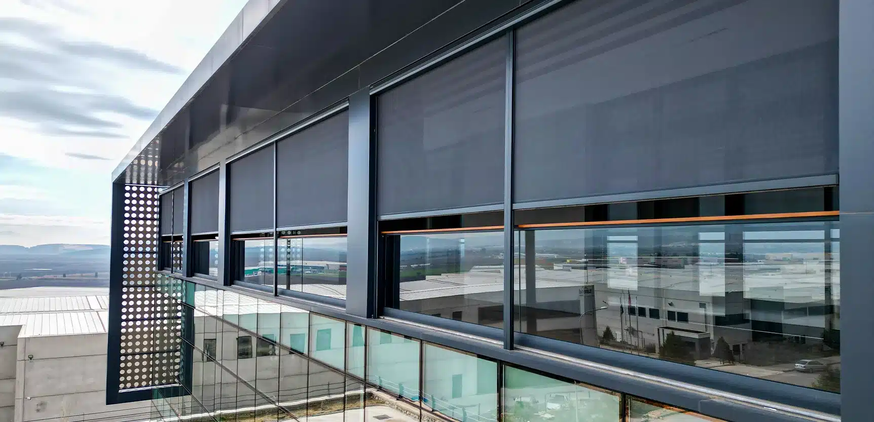 External zip screen blinds on a building façade